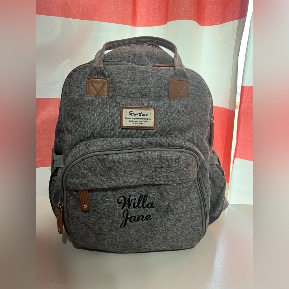 Monogrammed grey diaper bag. “Willa jane” in cursive